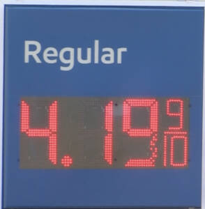 A gas price sign with the numbers 4. 1 9 9 and regular